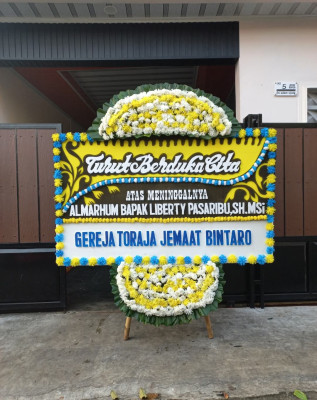 Papan Bunga Duka di Poyowa Besar Satu